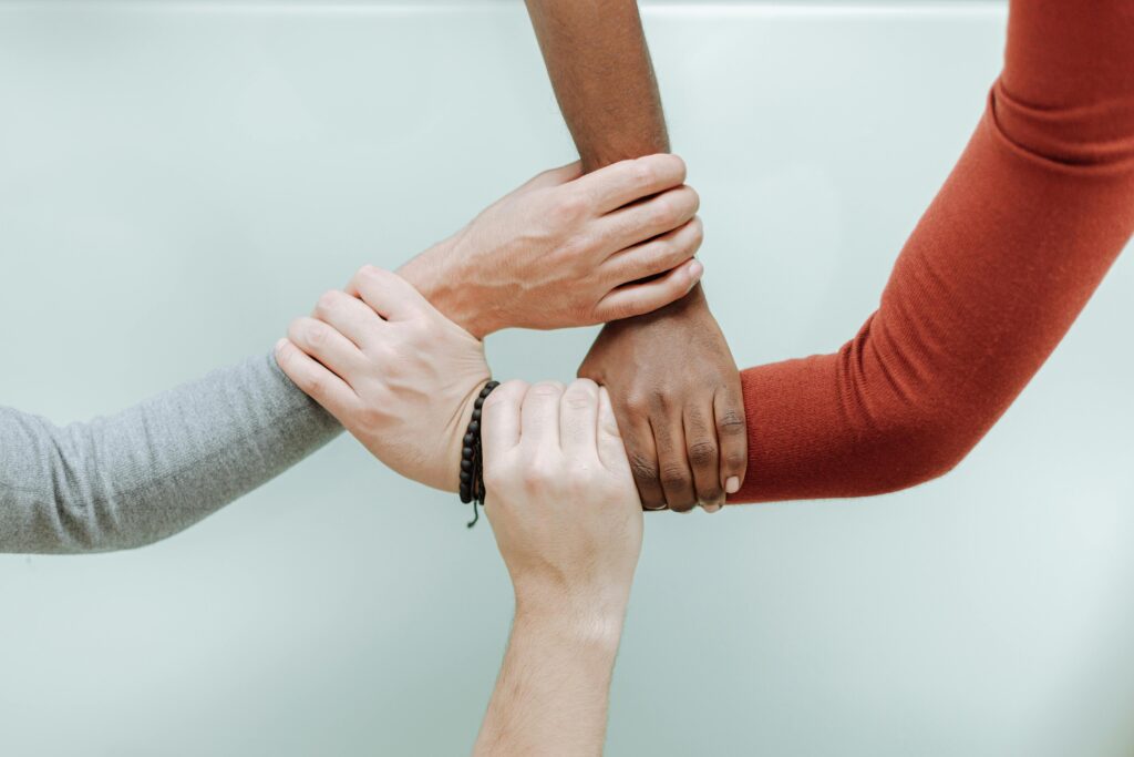 diverse hands holding each other
