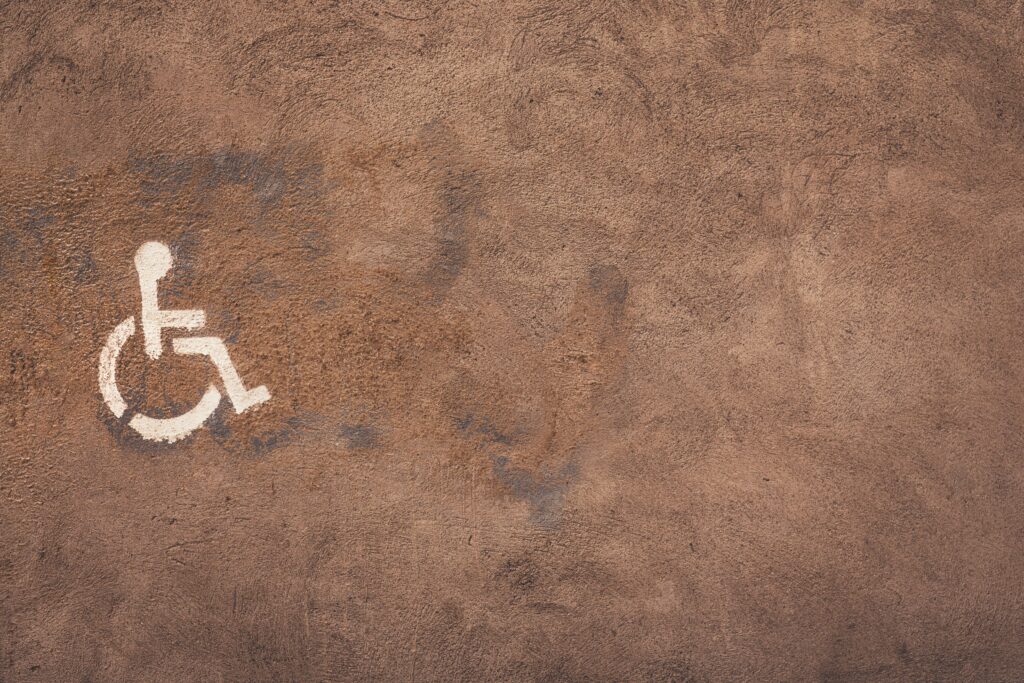 disability sign on a brown surface